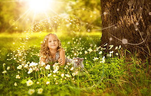girl's sitting with white petaled flowers plant HD wallpaper