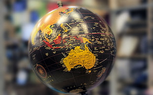 black and brown desk globe, globes, Australia, continents HD wallpaper