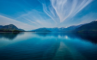 body of calm lake under blue sky during daytime, water, sky, clouds, mountains