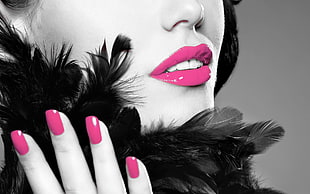 selective color of pink lipstick and pink nail polish