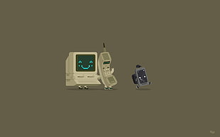 white and gray computer monitor and telephone