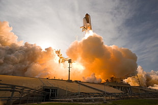 space shuttle lifting off during daytime HD wallpaper