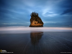 brown rock monolith, landscape, beach, island, National Geographic