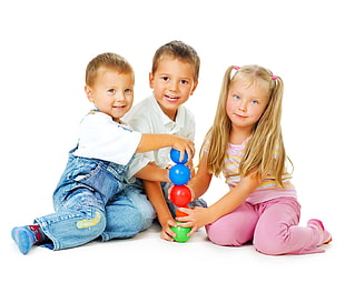 three children playing together photography