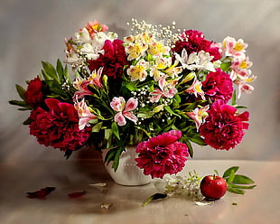 red Carnation, pink, white, and yellow Peruvian Lily flowers bouquet