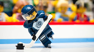 blue ice hockey player mini fig plastic toy, LEGO, ice hockey, NHL, puck