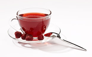 clear glass cup filled with red liquid