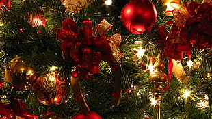 red, green, and brown Christmas tree with string lights and baubles, Christmas, holiday, Christmas ornaments 