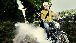 man riding a bicycle wearing helmet HD wallpaper