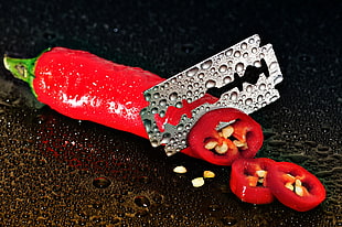red pepper sliced by silver razor