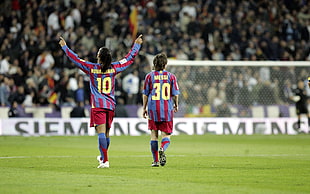 two soccer player standing near white goal net, Ronaldinho, Lionel Messi, Leo Messi, footballers