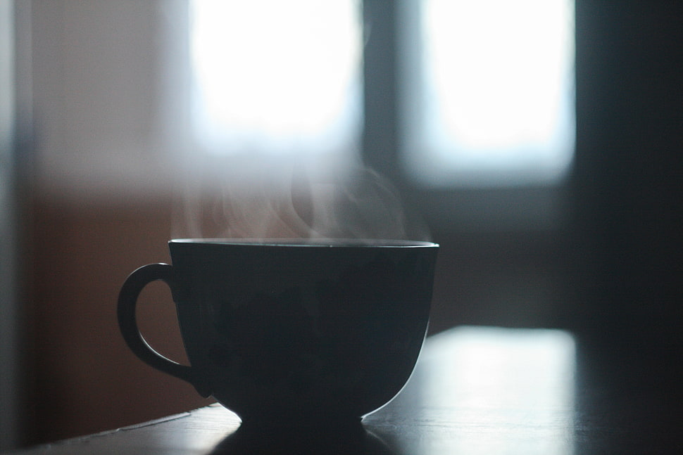 black cup on table HD wallpaper