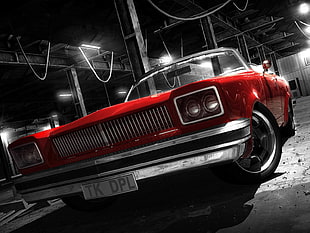 selective color photo of classic red car