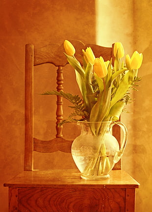selective focus photography of yellow Tulips in glass vase HD wallpaper