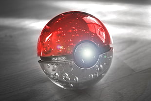 red and gray Pokeball toy