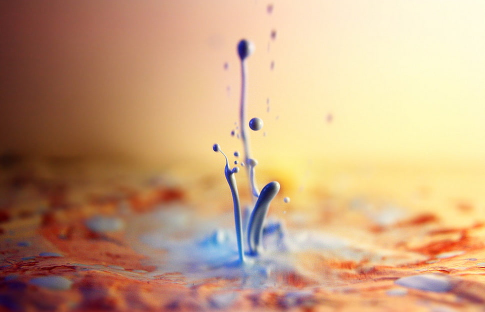 time lapse photo of blue and brown liquid HD wallpaper