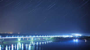 white concrete bridge, city, bridge, night, stars