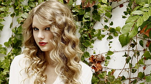 Taylor Swift wearing white top