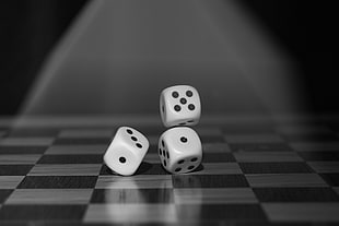 three dices on checked board HD wallpaper