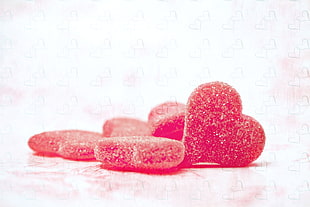 bunch of red heart gummy
