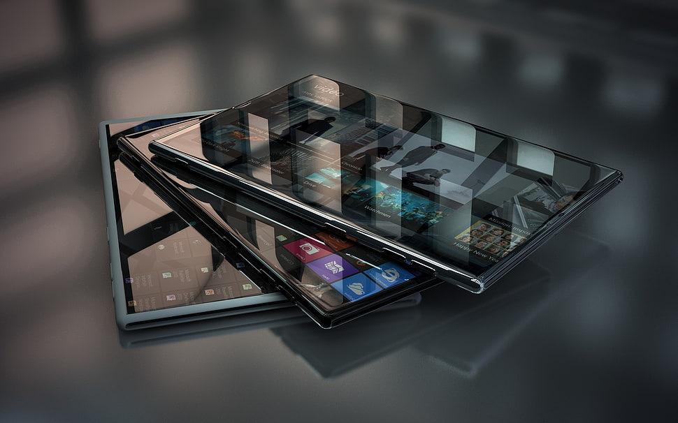 two black and one blue digital devices on black surface HD wallpaper