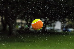 yellow and orange tennis ball, balls, water