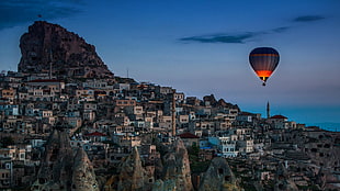 red and grey hot air balloon, city, house, building, sunset