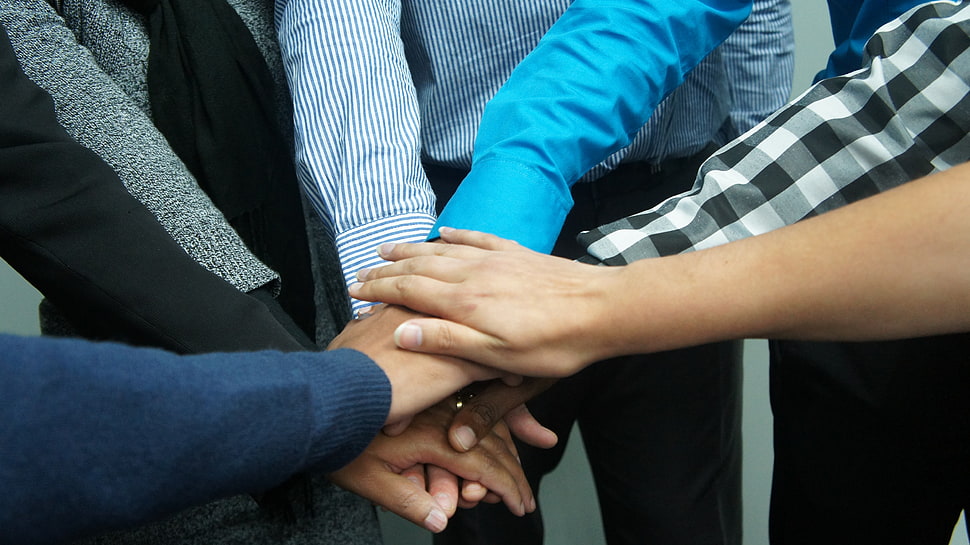 group of people hands join together HD wallpaper
