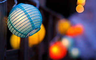 focused photo of blue ball lantern HD wallpaper