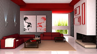 two red sofas in front of coffee table inside room