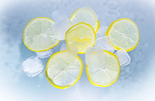 six lemon slice on fresh ice