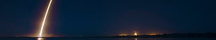 body of water during nightime