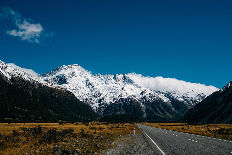 snowy mountains, mountains, road, snow, clouds HD wallpaper