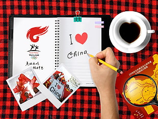 person writing I heart China