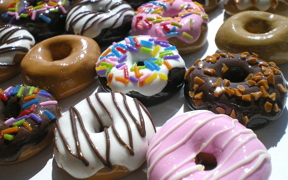 assorted flavors of doughnuts HD wallpaper