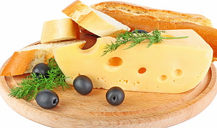 cheese and bread on wooden tray