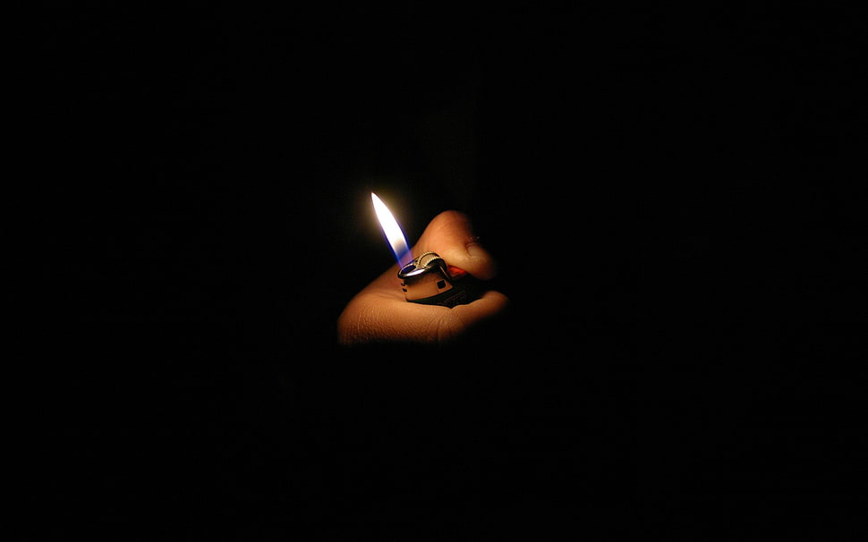 person using lighter HD wallpaper