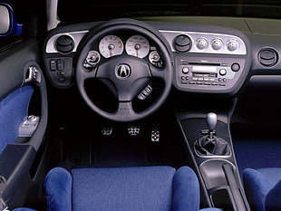 closeup photography of black Acura interior