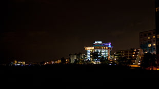 buildings lighted up at night