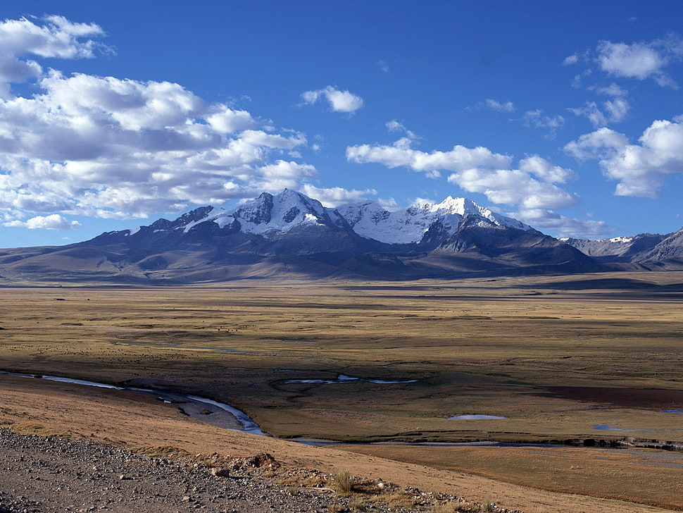brown sand near gray mountain HD wallpaper