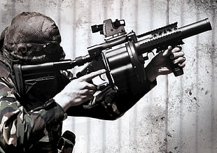 army holding sub-machine gun screensaver HD wallpaper
