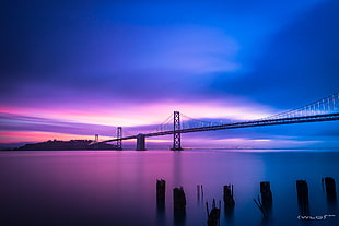 golden gate bridge under blue and purple sky