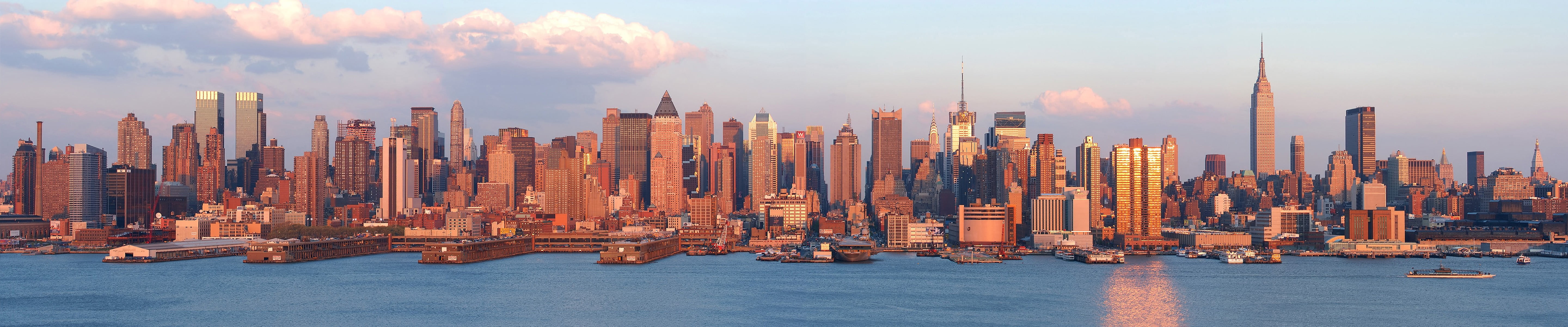 panoramic photography of metropolis under stratus clouds