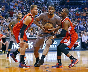 Phoenix Suns player vs Los Angeles Clippers players basketball game