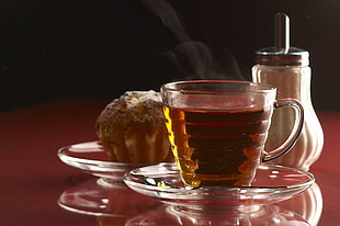clear glass teacup beside cupcake HD wallpaper