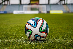 round white, green, blue, black, and red ball