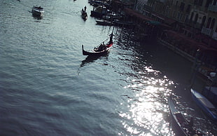 photography of brown boat on body of water