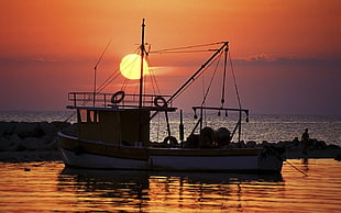 white boat, sunset
