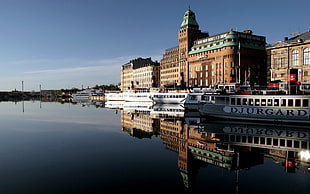 brown concrete building, cityscape, reflection, boat, Stockholm
