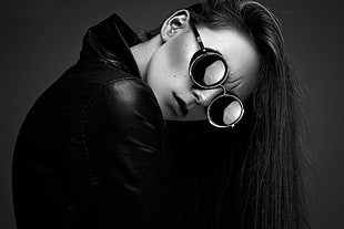 grayscale photo of woman wearing hippie sunglasses